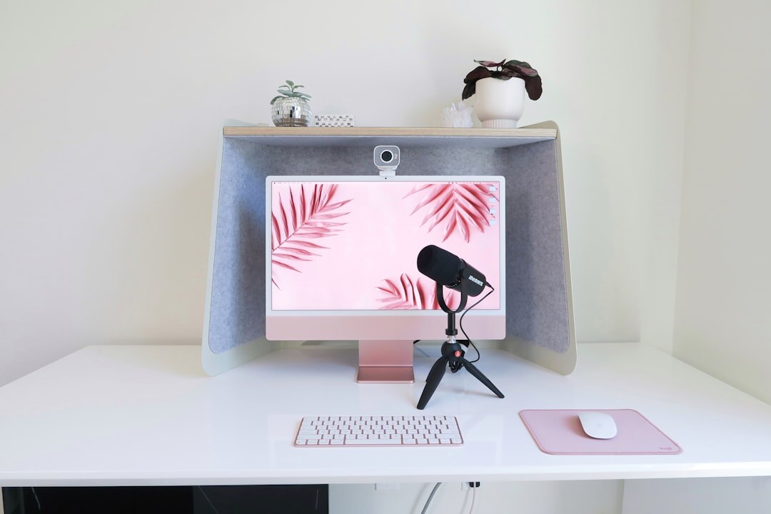 Laptop and camera on a desk for content creation